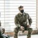 U.S. Army sergeant at a court hearing discussing insider trading allegations.