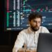 A digital illustration of a job seeker analyzing blockchain data on a computer screen.