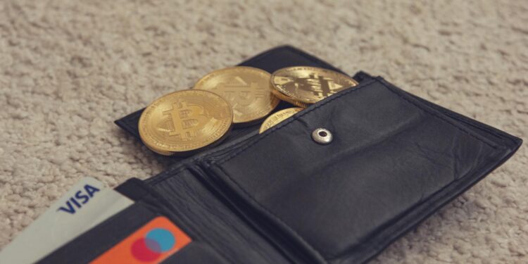 Crypto gift cards displayed with a digital wallet and KYC compliance documents.