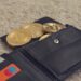 Crypto gift cards displayed with a digital wallet and KYC compliance documents.