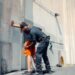 Police arresting a man in a financial office, raising compliance worries.