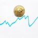 Bitcoin logo with an upward graph, symbolizing growth in DeFi and cryptocurrency regulations.