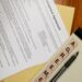 Evernorth SEC filing document with XRP logo and SPAC merger graphics.