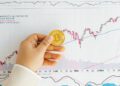 Graph showing a rising trend in cryptocurrency investments and financial charts.