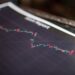 A graph showing Robinhood's declining crypto revenue alongside financial metrics.