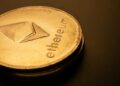 Ethereum tokens on a digital exchange interface showcasing a sale transaction.