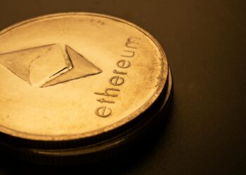 Ethereum tokens on a digital exchange interface showcasing a sale transaction.