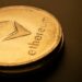 Ethereum tokens on a digital exchange interface showcasing a sale transaction.
