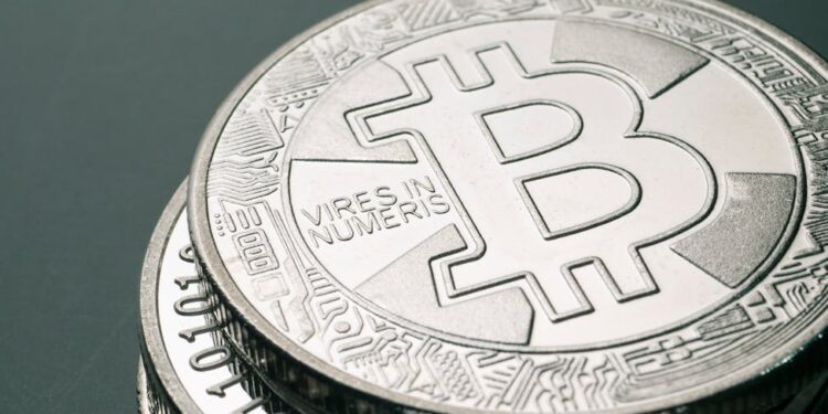 Stacks of digital currency tokens with a burning effect, symbolizing token burn strategy.