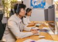 North Korean workers at computers involved in cryptocurrency operations.