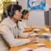 North Korean workers at computers involved in cryptocurrency operations.