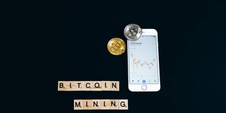 Bitcoin mining hardware with a fluctuating cryptocurrency price chart in the background.