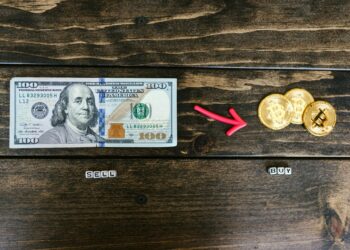 Cryptocurrency exchange logo surrounded by dollar signs and blockchain graphics.