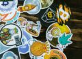 Bitcoin miner celebrating success with digital currency graphics in the background.