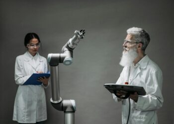 Researchers collaborate in a high-tech lab featuring quantum computers and AI equipment.