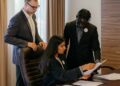 Senators deliberating over a legislative document related to cryptocurrency regulations.