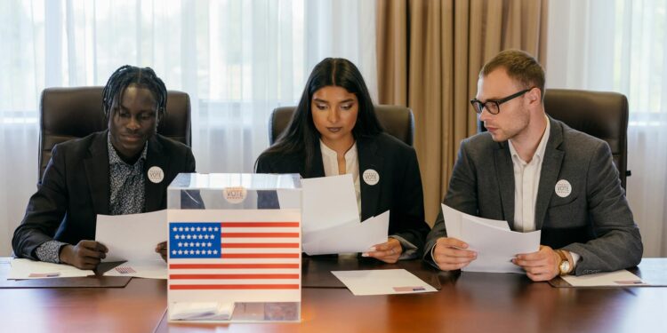 A group of officials discussing cryptocurrency regulations at a conference table.