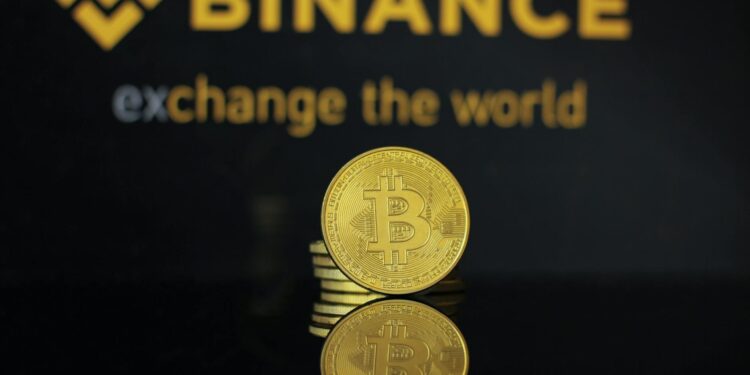 Golden MEGA token logo with Binance, KuCoin, and Bitget exchange logos in a crypto market setting.