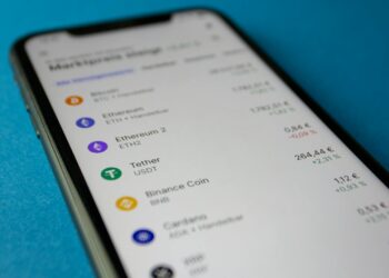 A user interacting with the Binance wallet app displaying prediction market features.