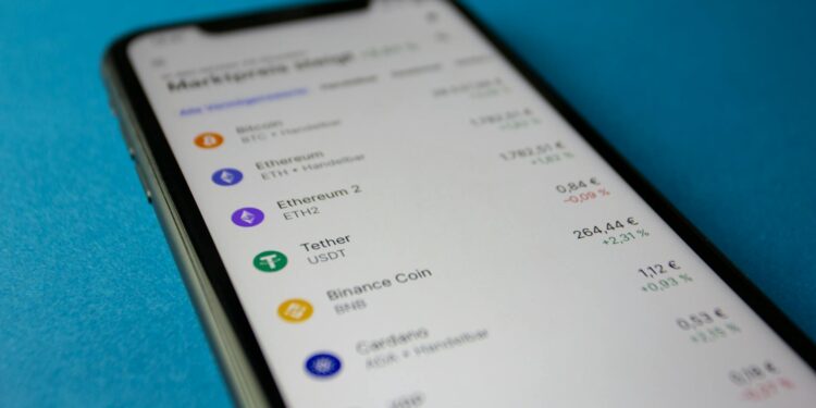 A user interacting with the Binance wallet app displaying prediction market features.