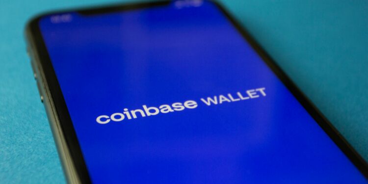 Bitcoin symbol overlaid on a digital wallet interface with Coinbase Prime branding.
