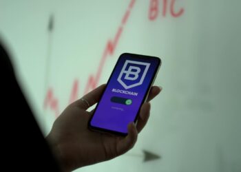 Graph depicting blockchain connections with financial symbols and a $44 million announcement banner.