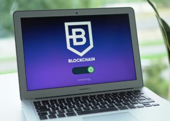 A digital representation of blockchain technology with security icons in the background.