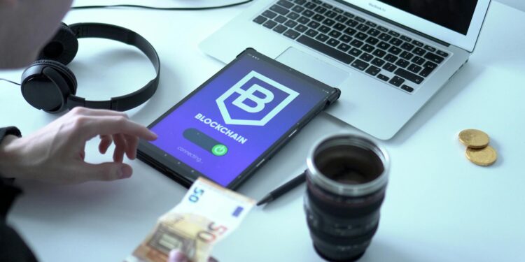 A digital wallet screen displays XRP as a payment option alongside other cryptocurrencies.