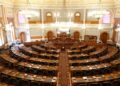 Minnesota lawmakers discuss regulations on AI-created explicit content in a legislative session.