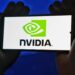 Nvidia, Microsoft, and AWS logos overlaid on a digital circuit board background.