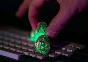 A visual representation of cryptocurrency thefts, with a dark hacker silhouette and digital currency icons.