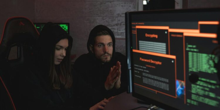 Cybersecurity experts analyzing data on screens to address crypto threats from Lazarus.