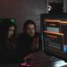 Cybersecurity experts analyzing data on screens to address crypto threats from Lazarus.