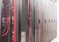 Data center with servers, highlighting crypto market fluctuations and financial operations.