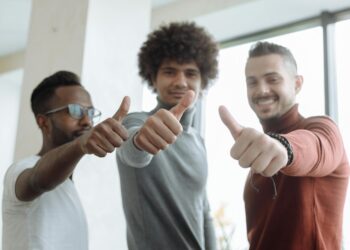 A team at White Tech celebrates receiving MiCA approval for cryptocurrency operations in Croatia.
