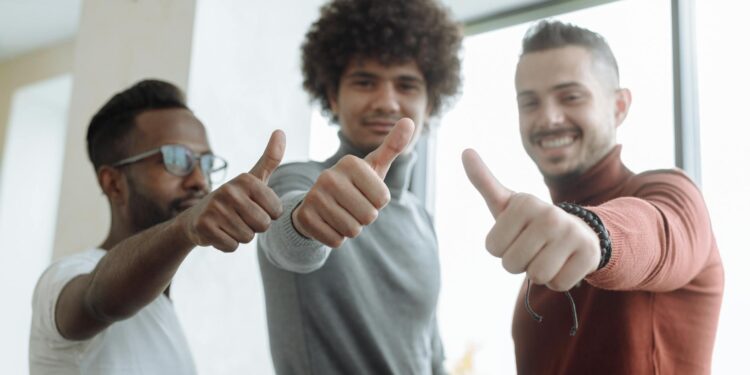 A team at White Tech celebrates receiving MiCA approval for cryptocurrency operations in Croatia.