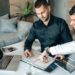 Team of financial professionals collaborating on cryptocurrency regulations and oversight strategies.