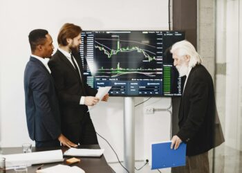 Venture capitalists discussing AI and space technology investments at a conference.