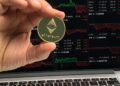 Crypto whales monitoring Ethereum trends on digital devices with financial graphs displayed.