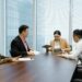 Evernorth board meeting with OpenAI CFO discussing Nasdaq listing strategies.