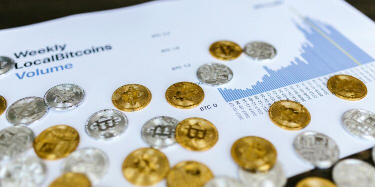 Financial charts and cryptocurrency symbols representing changes in crypto regulation in France.