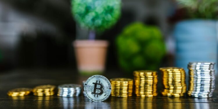 Stacks of cryptocurrency coins with US Treasury emblem in the background.