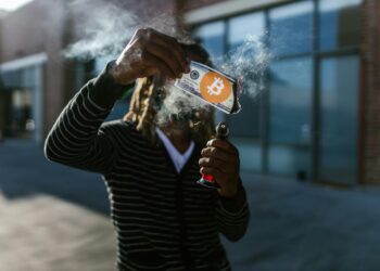 A digital illustration of a broken cryptocurrency wallet with dollar signs and hacking symbols.